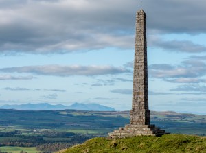 Tall monument on a hill with views across Ayrshire and towards the Isle of Arran