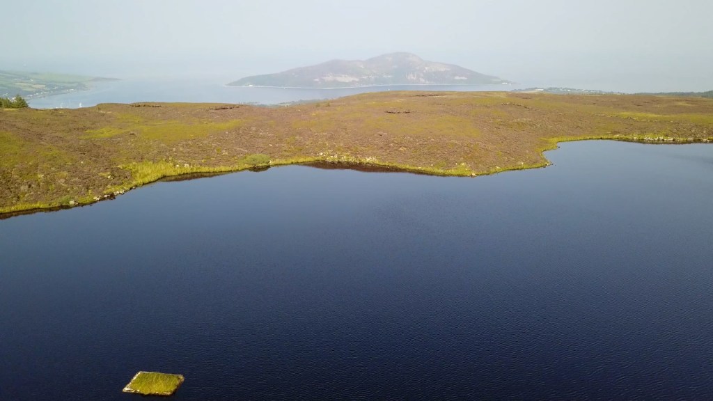 Urie Loch from above and the Holy Isle ahead