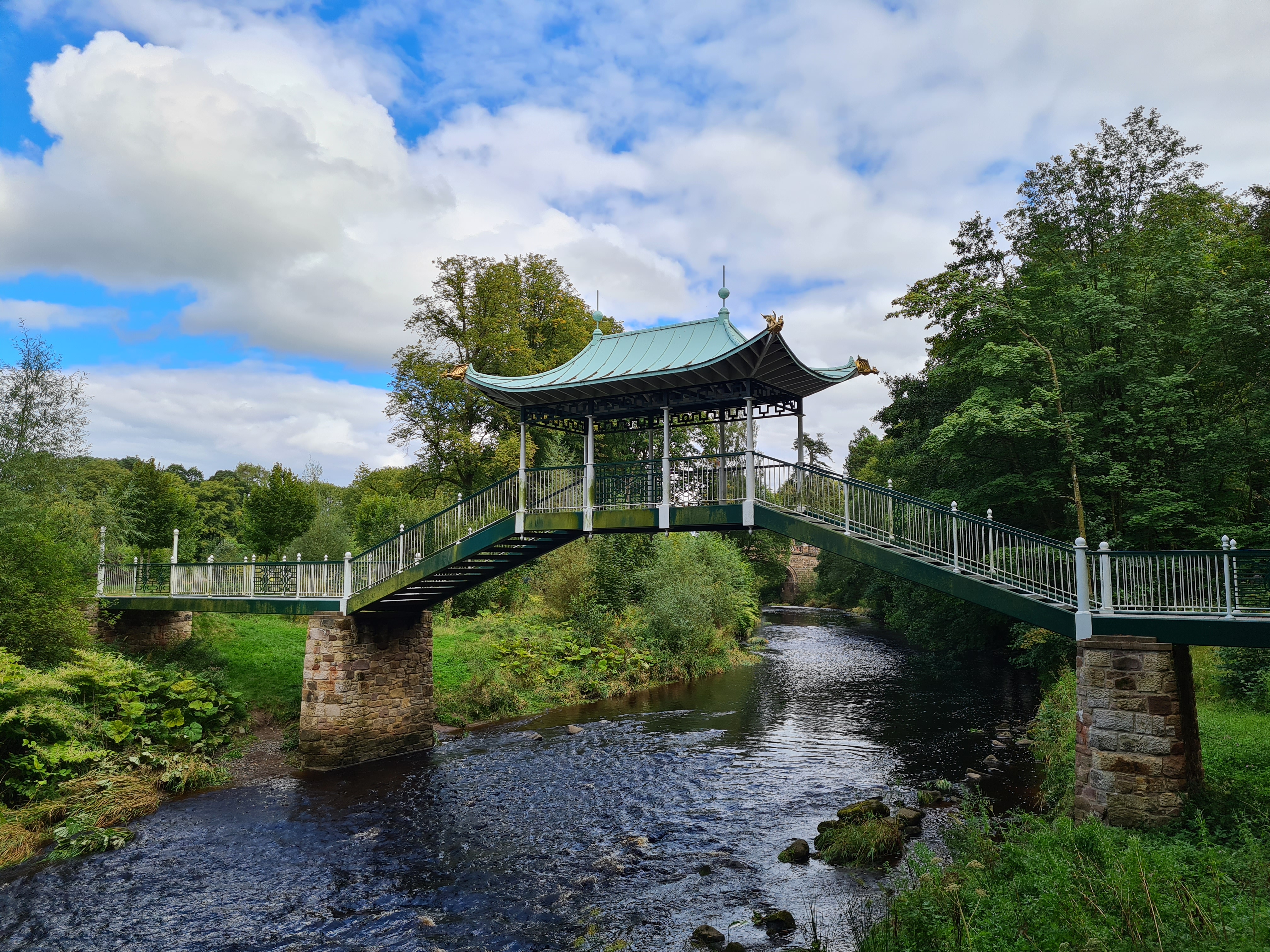 Chinese style footbridge across the water
