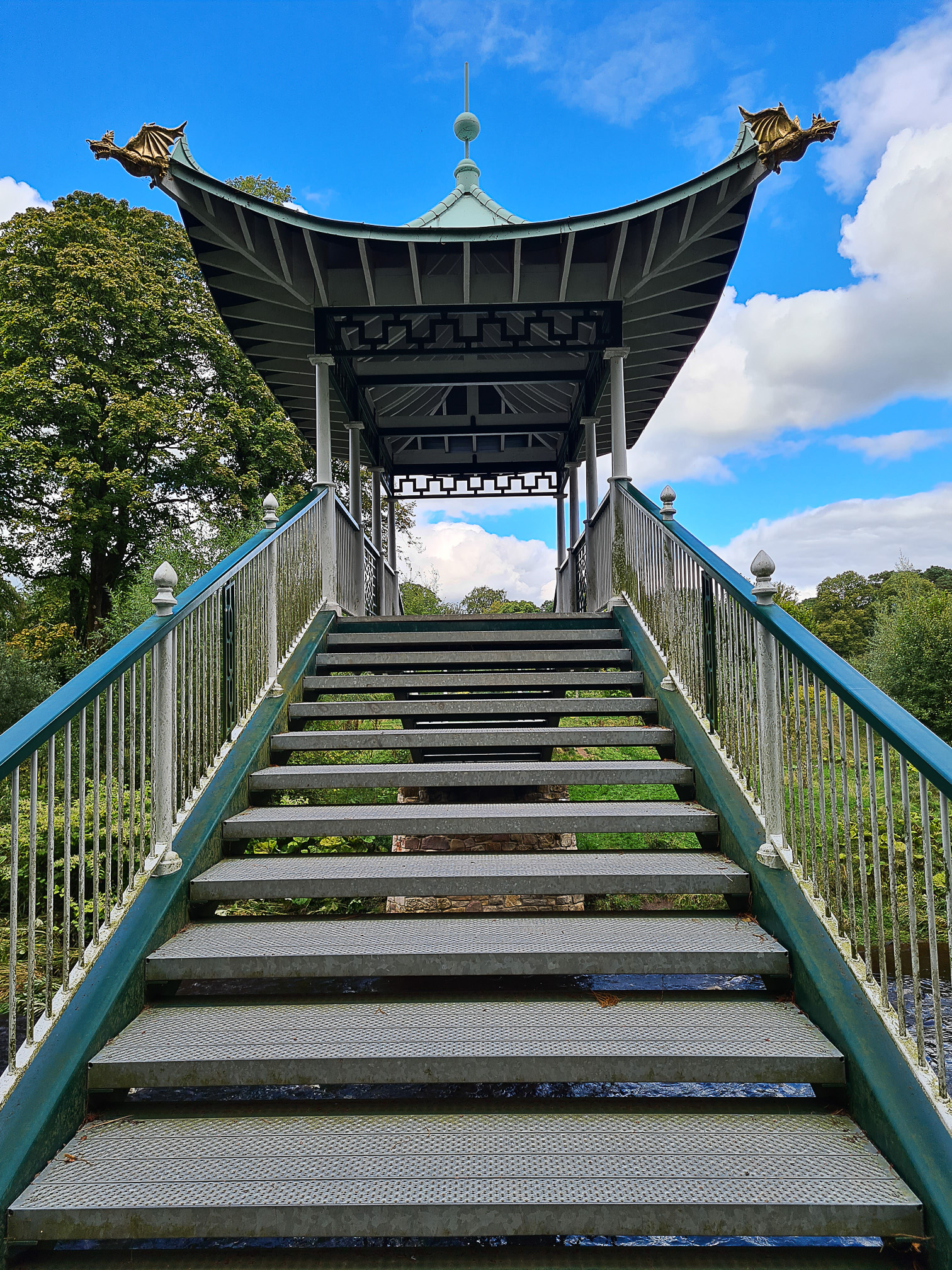 Chinese style footbridge across the water