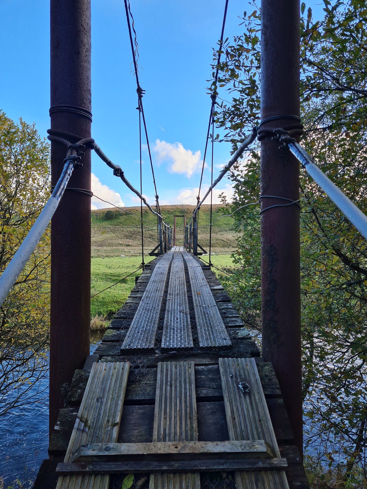 Suspension bridge across the river for the fishing people