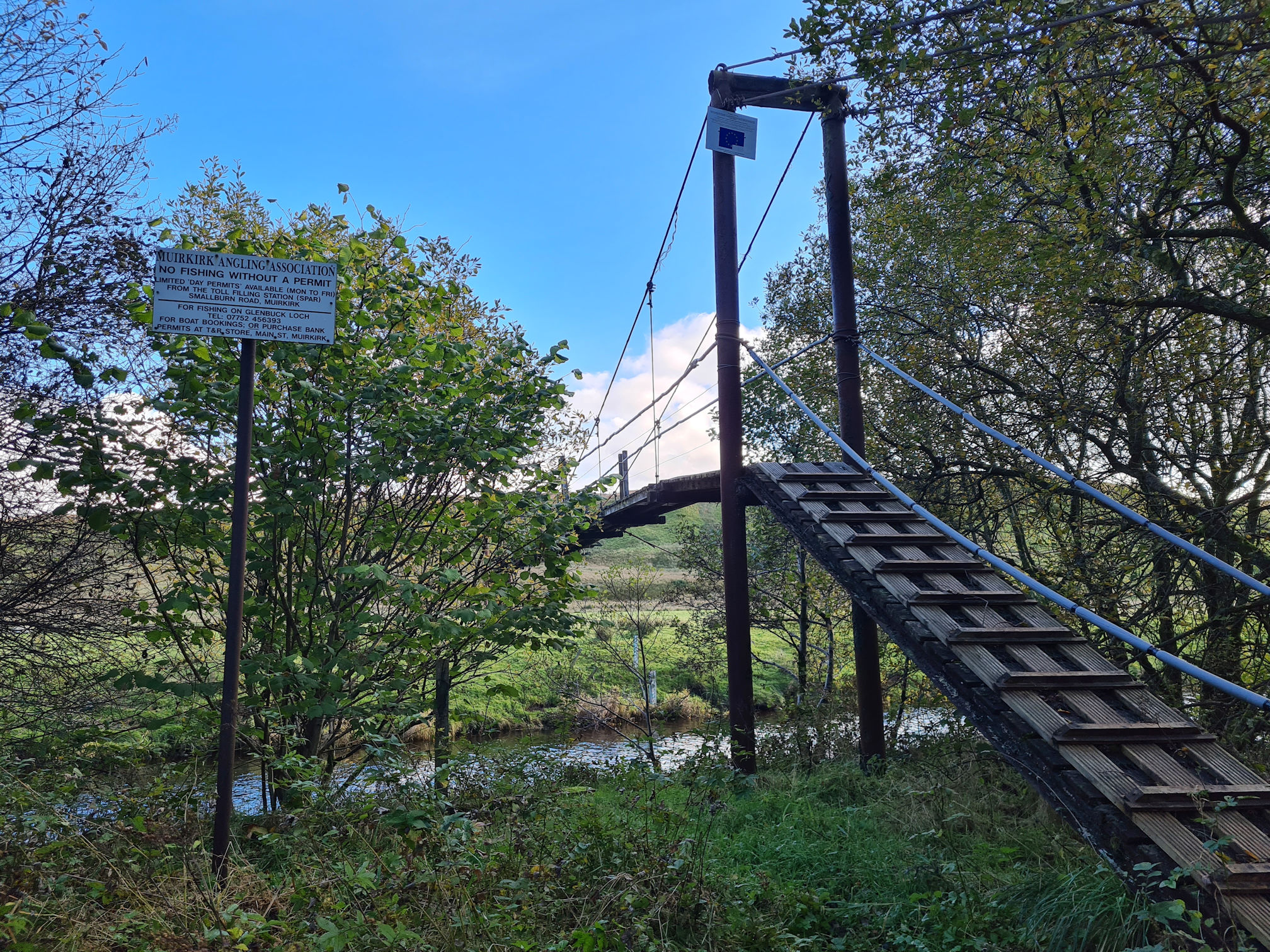 Suspension bridge across the river for the fishing people