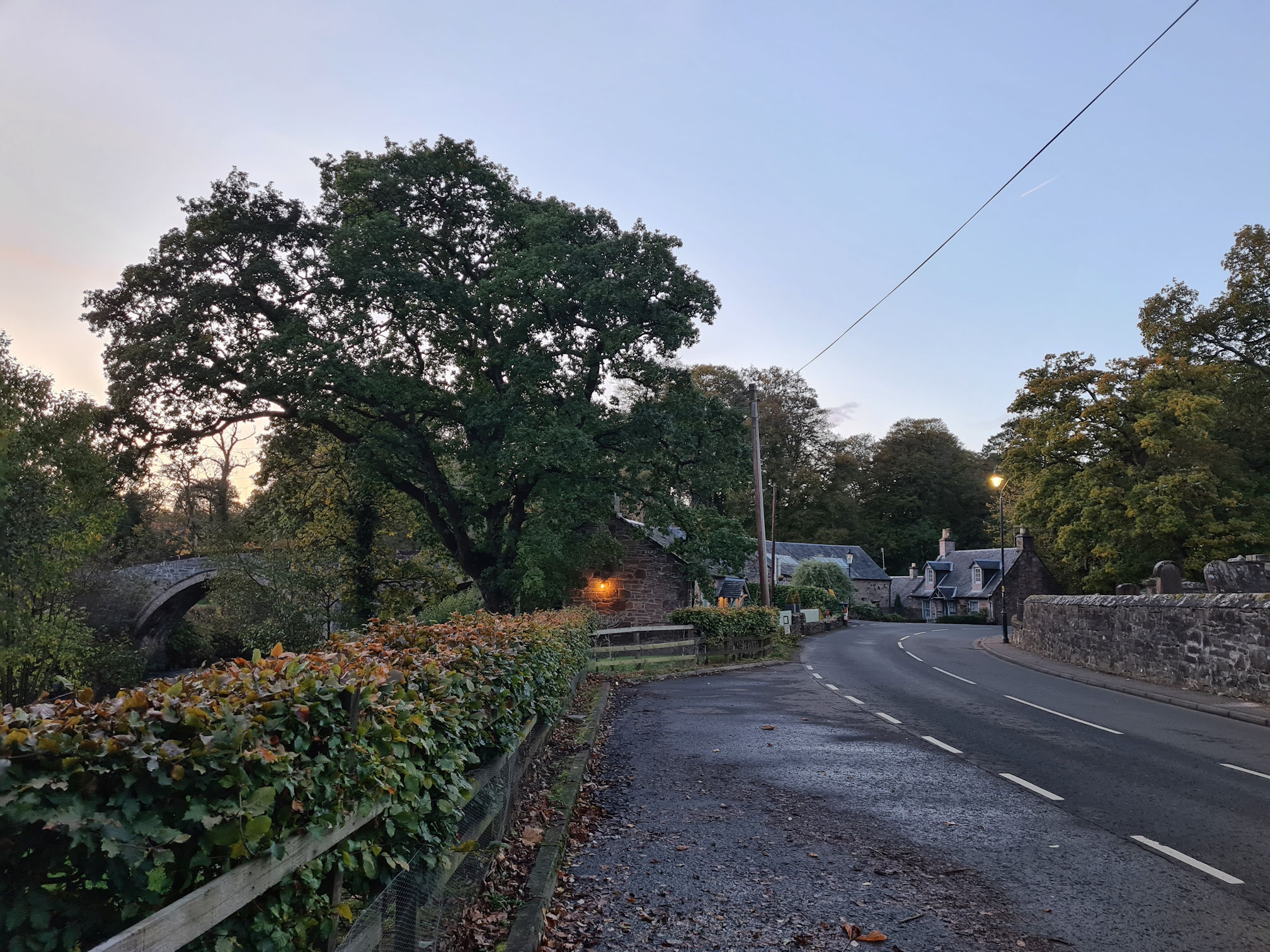 Road through the village of Sorn, street lights are on