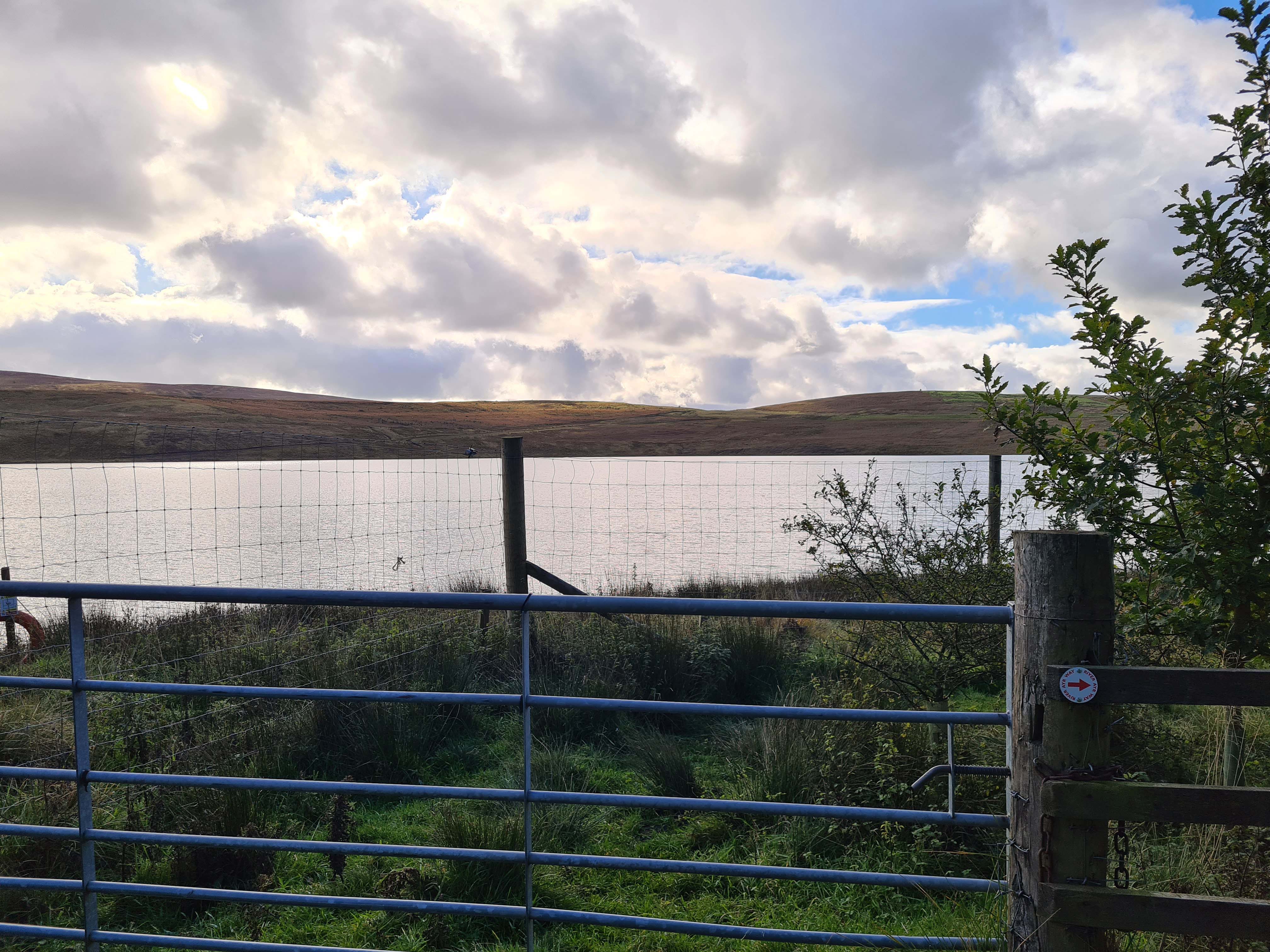 Gate, loch and hills