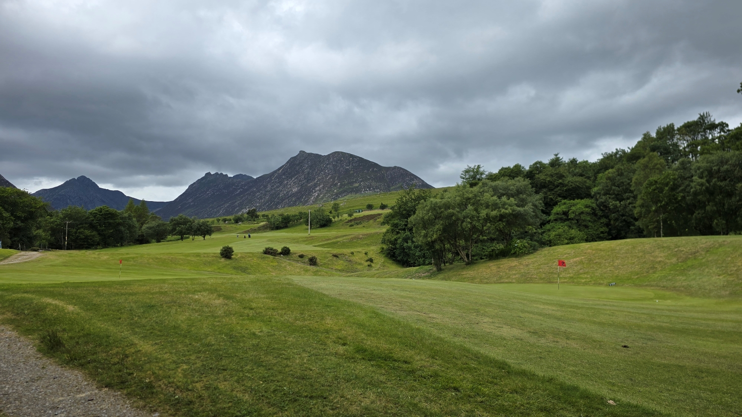 Corrie Golf Course with trees and mountain views