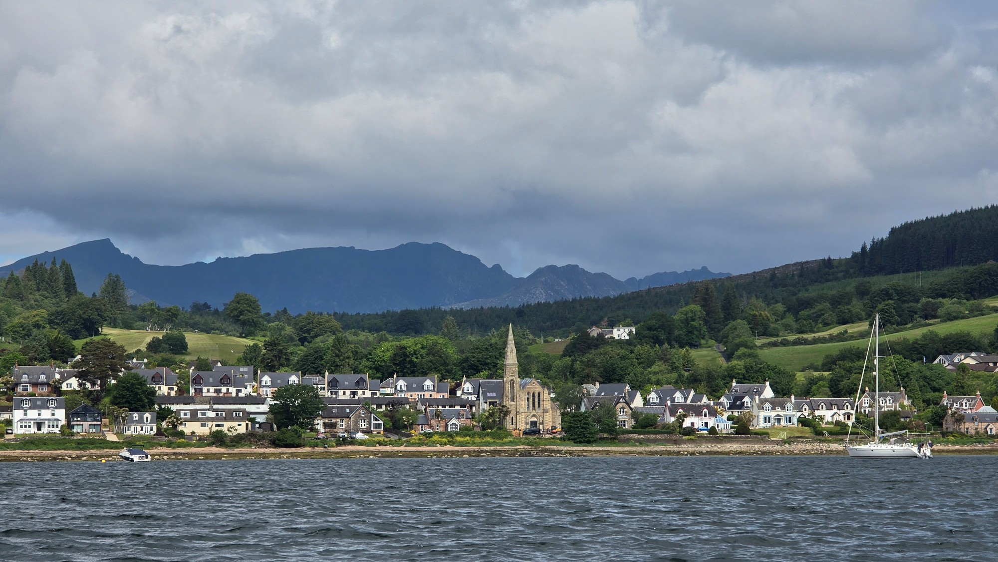Zoomed in view of Lamlash and the Arran mountains from a boat