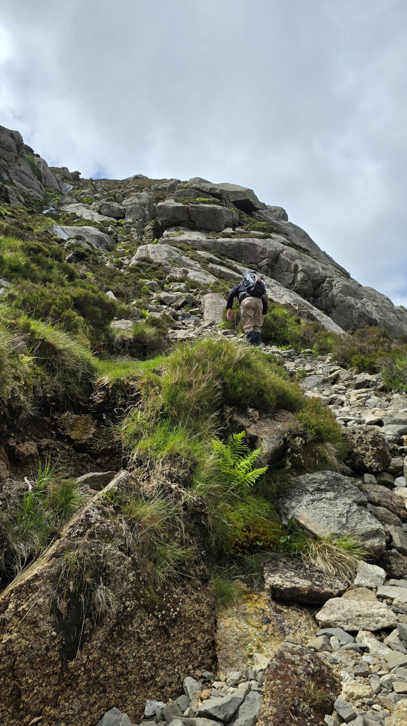 Steep rocky scramble leading up a mountain