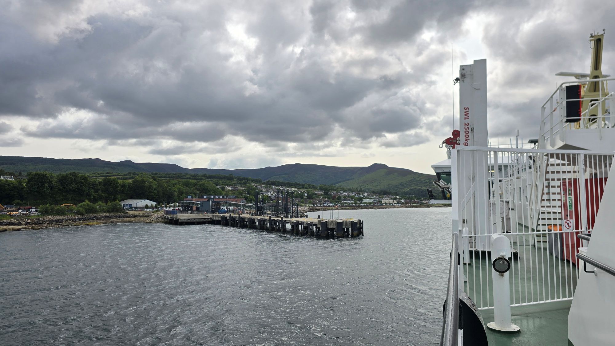 Ferry sailing to dock at Brodick on the Isle of Arran