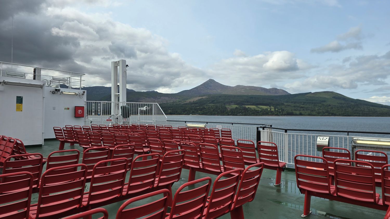 Red seats on the deck of the Glen Sannox ferry