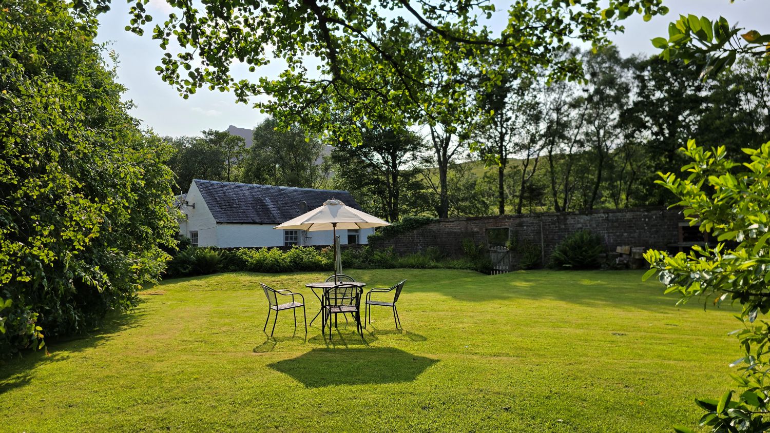 Walled garden, white cottage