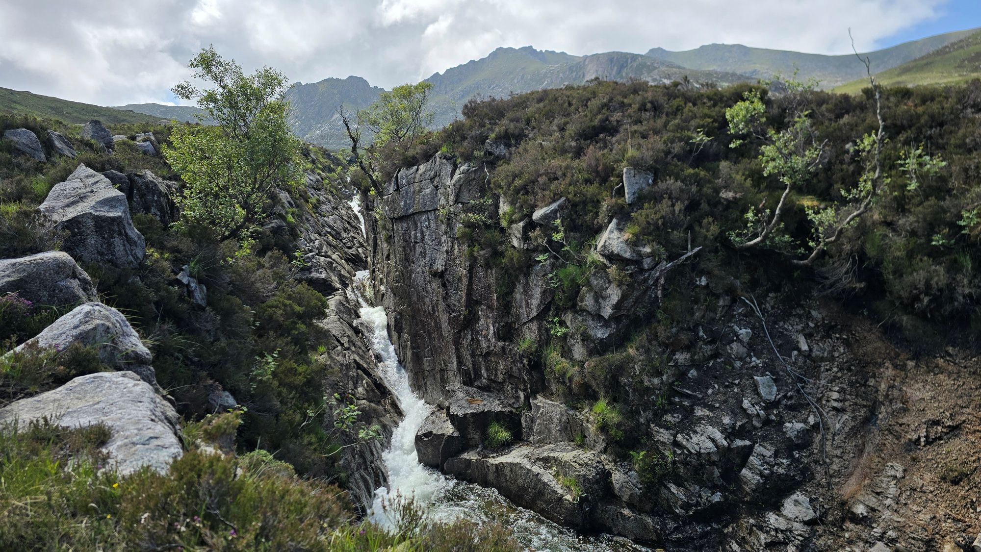 A deep gorge and waterfall