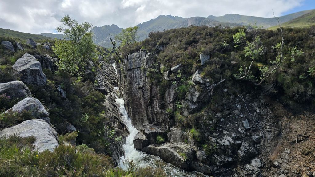 A deep gorge and waterfall